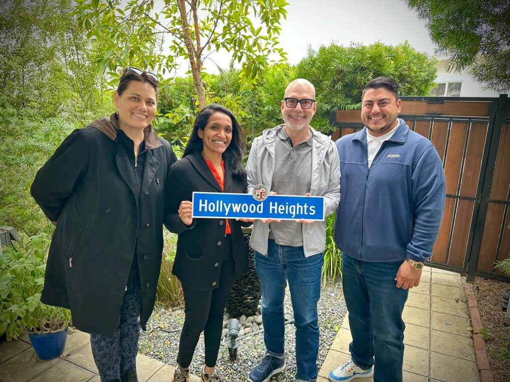 Nithya Raman, Todd Henricks, Lesley Holmes, and Josef Shiroky celebrate installation of official Hollywood Heights neighborhood signs.